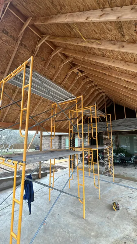 Interior scaffolding in a vaulted barn build