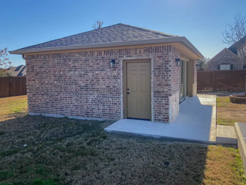 Brick home gym front entry