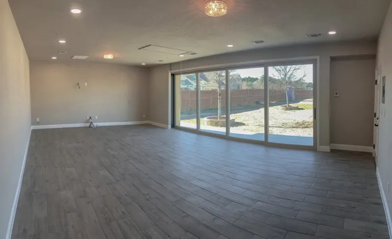 Open home gym interior with recessed lighting