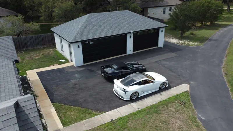Aerial drone view of a custom two-car detached garage in San Antonio
