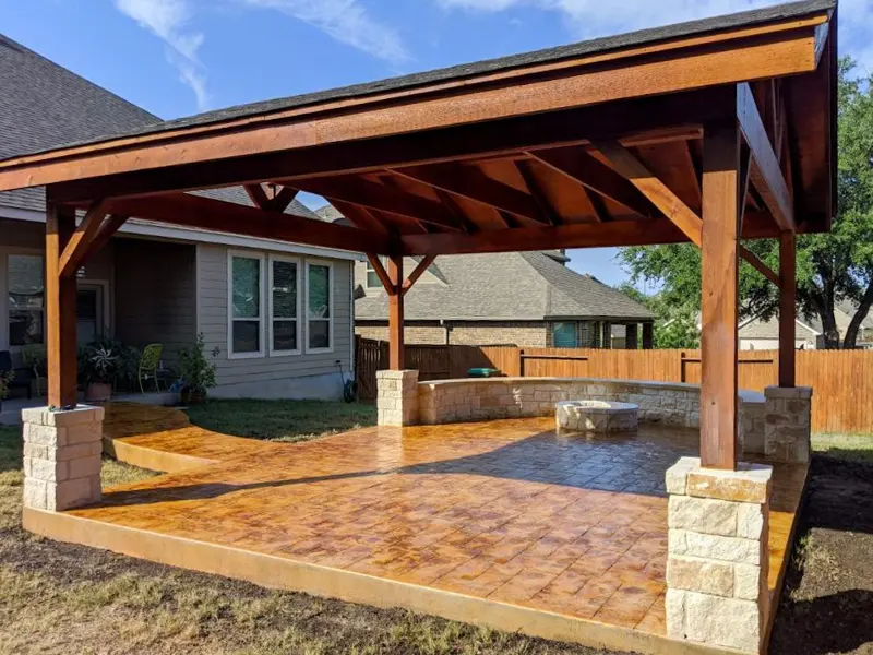 Cedar patio cover over stamped concrete