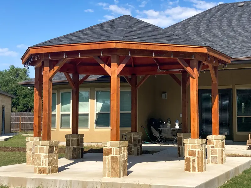 Cedar pavilion with stone column bases