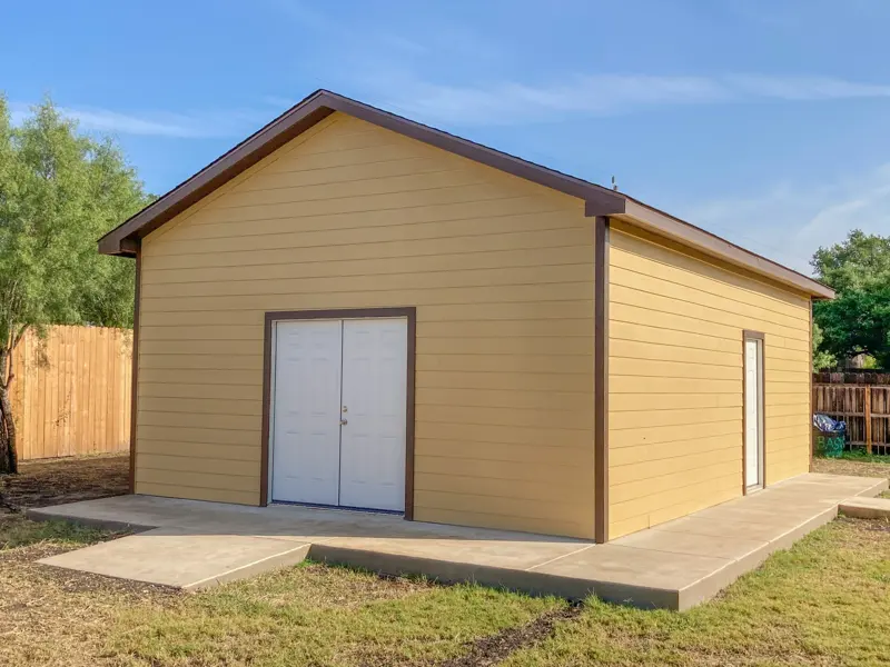Backyard workshop with double entry doors